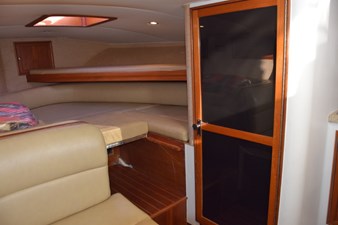 Portside door to head compartment. Forward quarter berth and overhead hatch