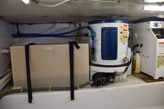 Holding tank, hot water heater, bait well pump