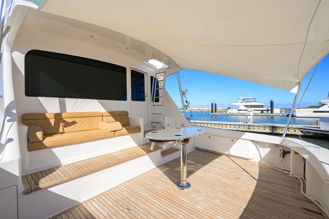 Mezzanine seat with sail shade up and tabletop on rocket launcher