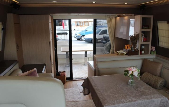 Interior view of salon on Monte Carlo, featuring sliding doors that take you to the exterior
