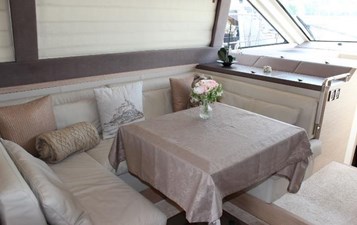 Interior view of salon on Monte Carlo, featuring comfortable seating area and a table