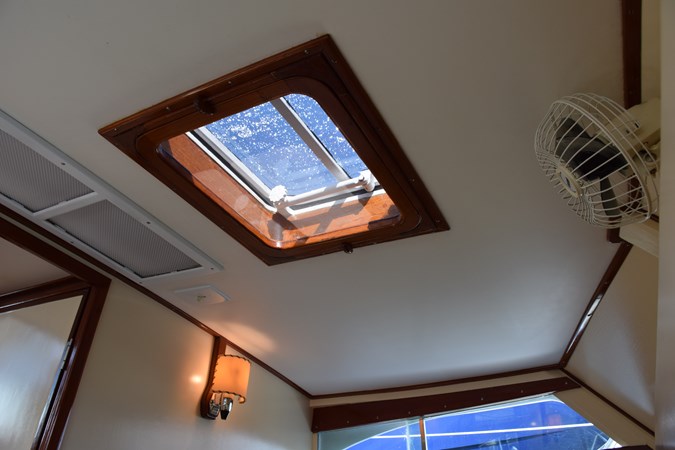Wood trimmed overhead deck hatch
