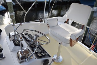 Ladderback helm chair can be used at flybridge helm