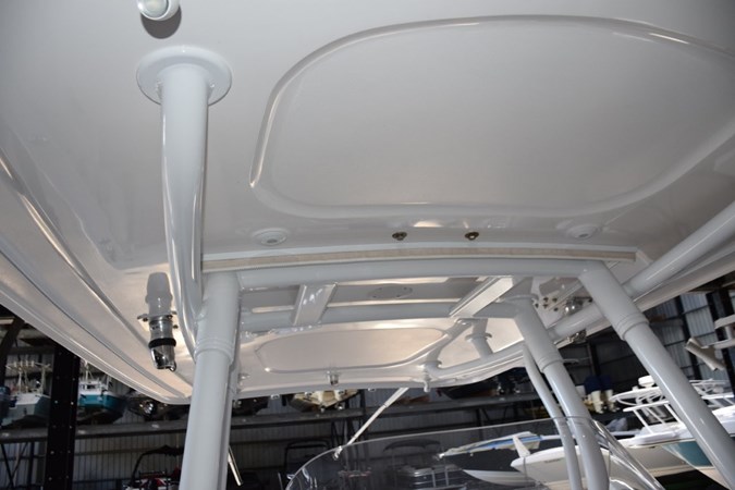 Hardtop supports and radial outrigger bases. Lighting in top.