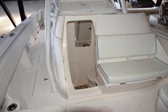 Console electrically slides open to head compartment.