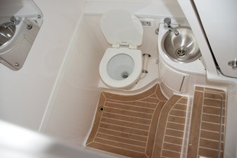 Head compartment beneath console