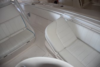 Electric raising backrests on forward seating console.