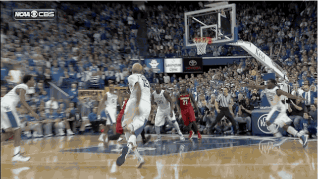 Louisville's Russ Smith Throws Down a Ferocious Dunk on Kentucky's Julius Randle