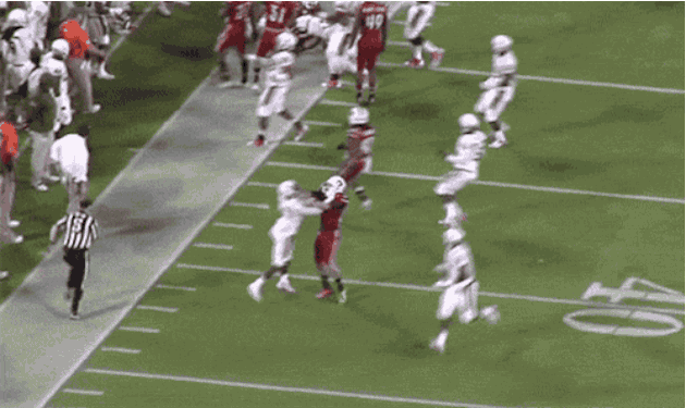 Louisville Punter John Wallace Gets a Personal Foul for Swinging at Miami Player
