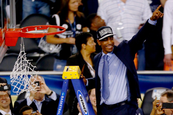 ARLINGTON, TX - APRIL 07: Head coach Kevin Ollie of the Connecticut Huskies acknowledges the crowd after defeating the Kentucky Wildcats 60-54 in the NCAA Men's Final Four Championship at AT&T Stadium on April 7, 2014 in Arlington, Texas. (Photo by Tom Pennington/Getty Images)