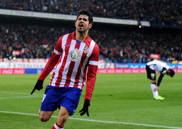 MADRID, SPAIN - DECEMBER 15: Diego Costa of Club Atletico de Madrid celebrates after scoring Atletico's opening goal during the La Liga match between Club Atletico de Madrid and Valencia CF at Vicente Calderon Stadium on December 15, 2013 in Madrid, Spain. (Photo by Denis Doyle/Getty Images)