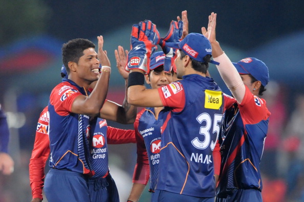 PRETORIA, SOUTH AFRCA - OCTOBER 13: Umesh Yadav (L) of the Daredevils celebrateswith team-mates after capturing the wicket of Yusuf Pathan (not pictured) of the Knight Riders during the Karbonn Smart CLT20 match between Kolkata Knight Riders (IPL) and Delhi Daredevils (IPL) at SuperSport Park on October 13, 2012 in Pretoria, South Africa. (Photo by Lee Warren/Gallo Images/Getty Images)