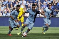 May 4, 2014; Kansas City, KS, USA; Sporting KC forward Dom Dwyer (14) controls the ball against the Columbus Crew during the second half at Sporting Park. Sporting KC defeats Columbus Crew 2-0. Mandatory Credit: Jasen Vinlove-USA TODAY Sports