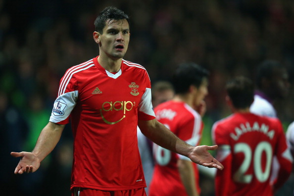 SOUTHAMPTON, ENGLAND - DECEMBER 04: Dejan Lovren of Southampton protests during the Barclays Premier League match between Southampton and Aston Villa at St Mary's Stadium on December 4, 2013 in Southampton, England. (Photo by Bryn Lennon/Getty Images)