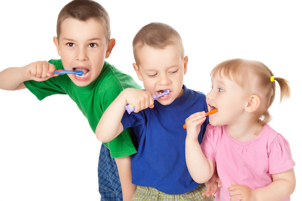 studio shot of children to brush his teeth