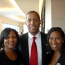 (left-right) Sheryl Merritt, Athletic Director Damon Evans and
Paula Life Merritt
