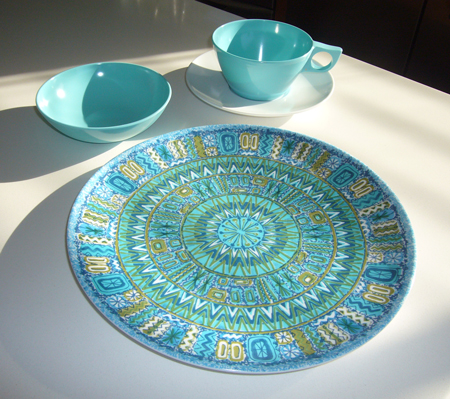 a tiny bowl, cup and saucer, and plate, melmac