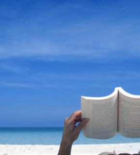 Reading-a-book-on-the-bea-001_medium