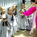 K_buddhist_monkettes_with_adult_thumb