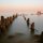 THE REMNANTS OF THE OLD PIER AT THE LAKE MICHIGAN   by Armando Mendoza