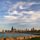 As the sun sets over the city by Christopher Foltz