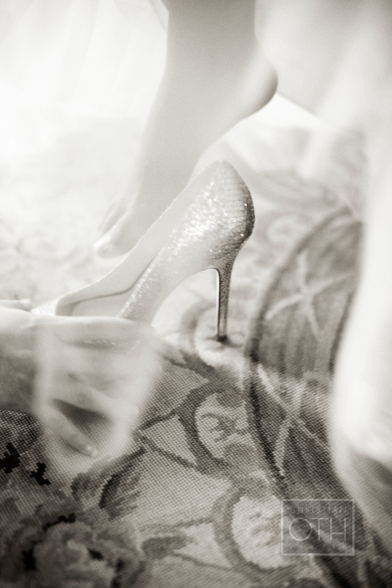 Bride stepping into Christian Louboutin shoes - Meredith Davenport of Christian Oth Studio