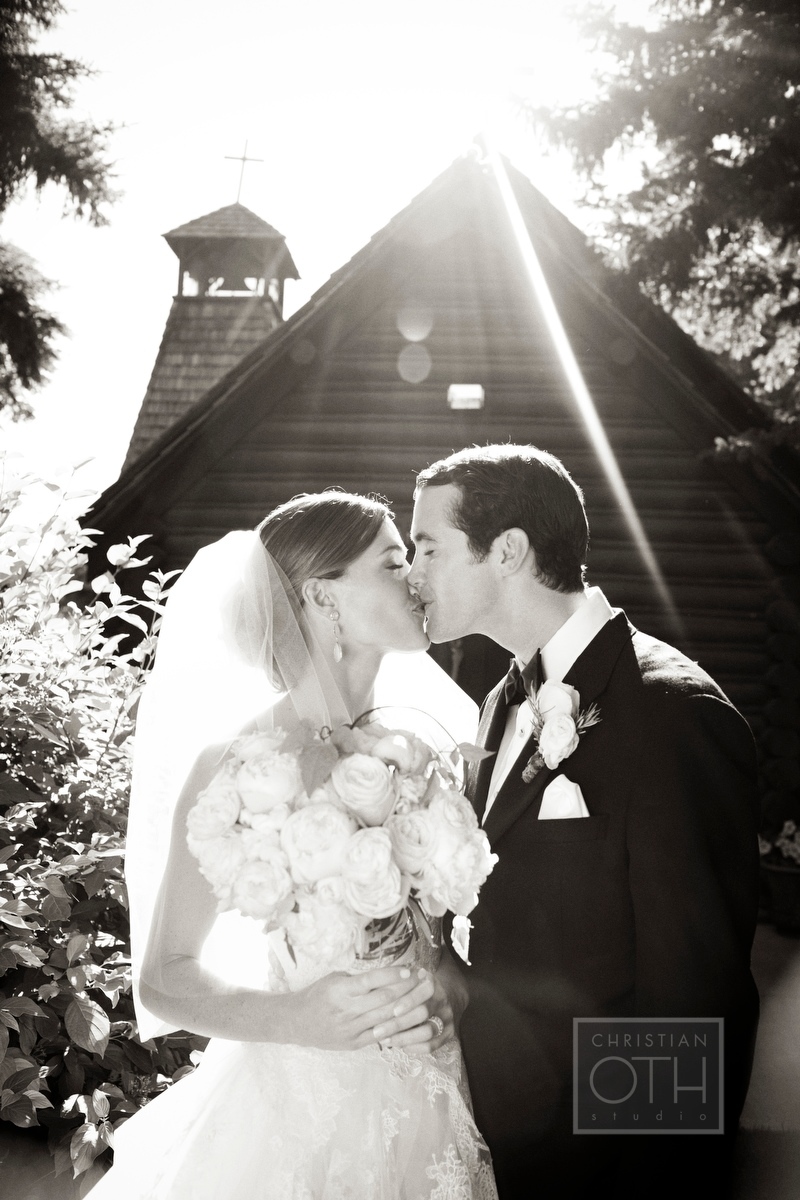 Bride and groom after their wedding ceremony in front of St Johns Episcopal church in Jackson Hole, WY - Christian Oth of Christian Oth Studio