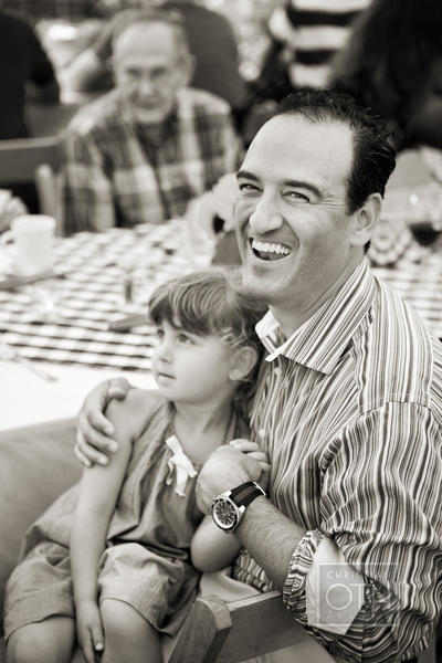 guest smiling with daughter - Glen Allsop of Christian Oth Studio
