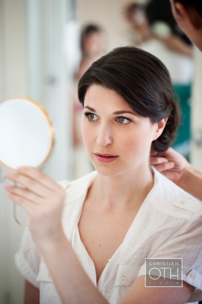 bride looking at hair - Christian Oth of Christian Oth Studio