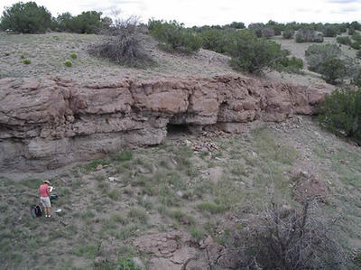 George Mason student Lindsey Vos recording a rockshelter during the 2006 field season