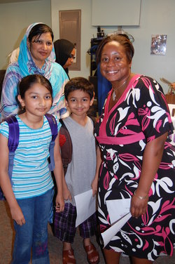 Amanda Andere, right, at FACET's Back to School Event