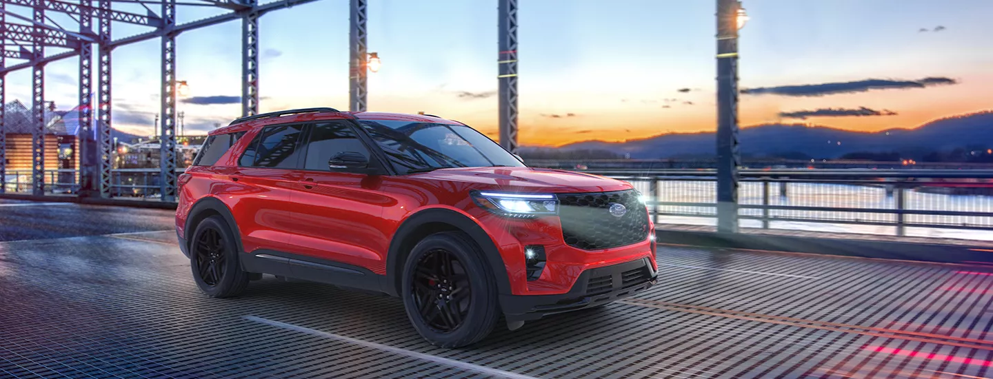 2026 Ford Explorer driving across a bridge at sunset in Lake City, FL