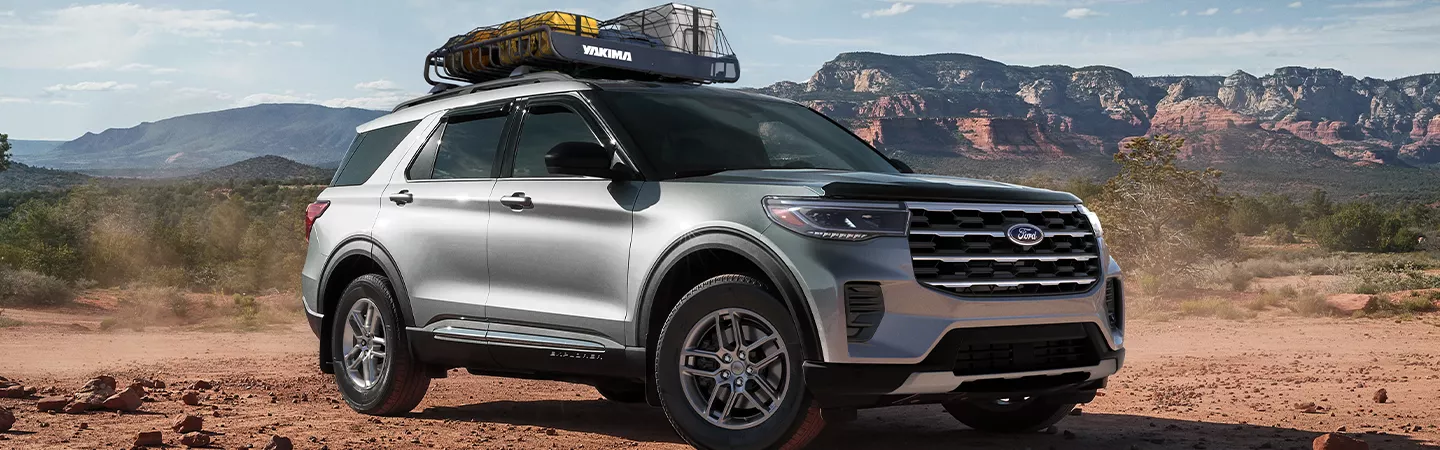 2026 Ford Explorer parked in front of desert mountains