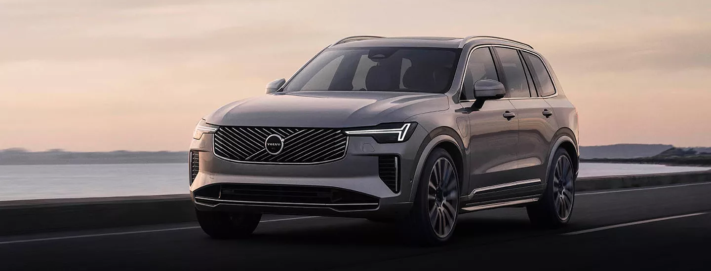 2026 Volvo XC90 Plug-In Hybrid parked in front of an ocean view