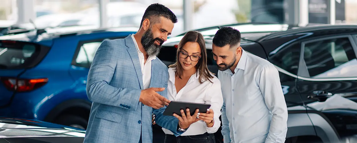 people car shopping in showroom