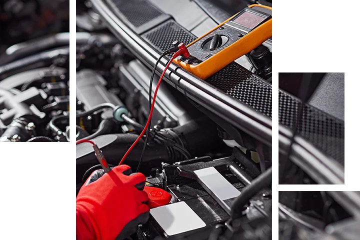 A subaru service tech testing a Battery in Nederland, TX