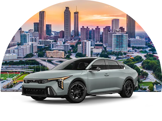 Kia car parked in front of a cityscape