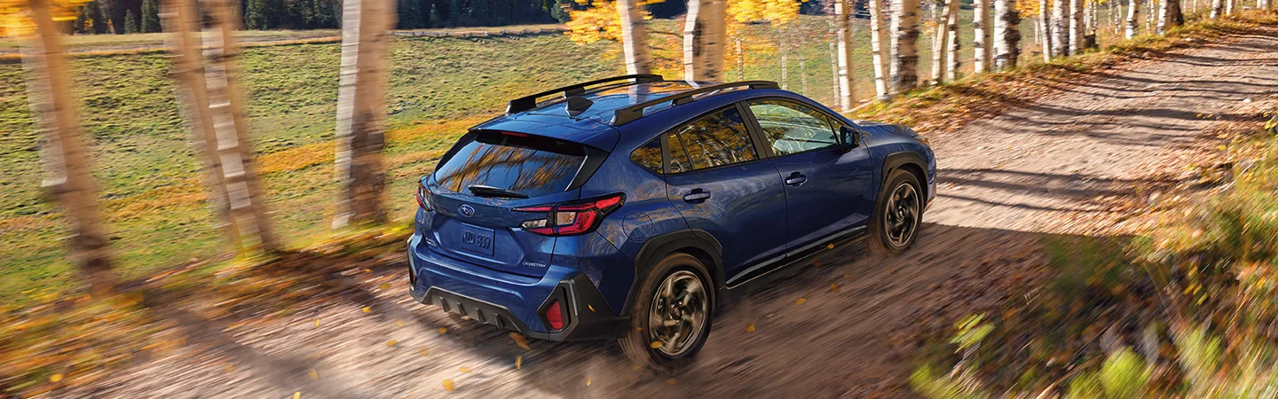 2025 Subaru Crosstrek vs Toyota Highlander Blue Color Side View
