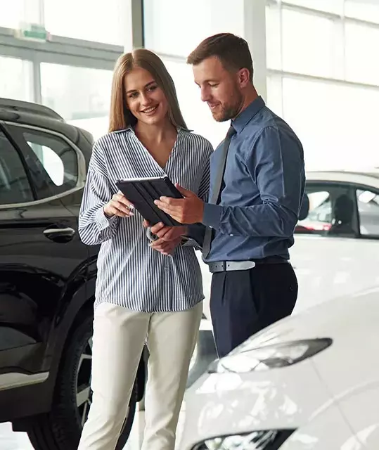 Vehicles displayed in a dealership showroom