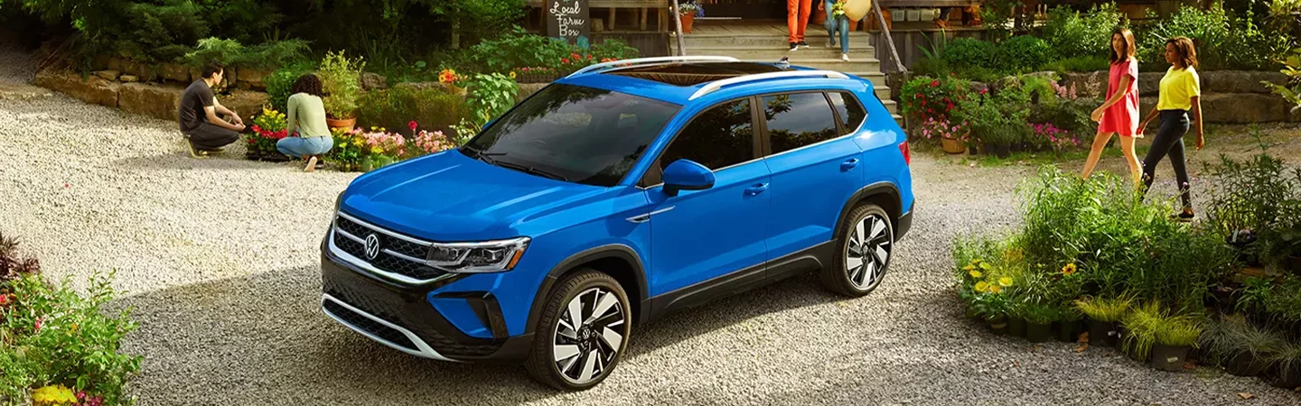 2024 Volkswagen Taos Specs blue color side view