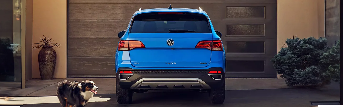 2024 Volkswagen Taos Specs blue color side view