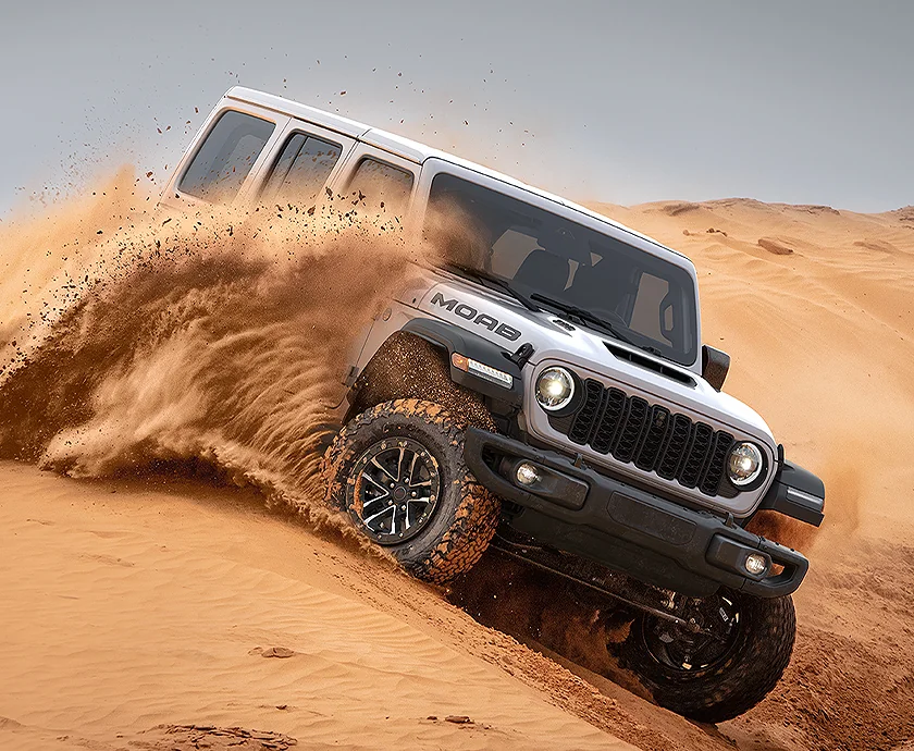 2026 Jeep Wrangler offroad in a sand dune