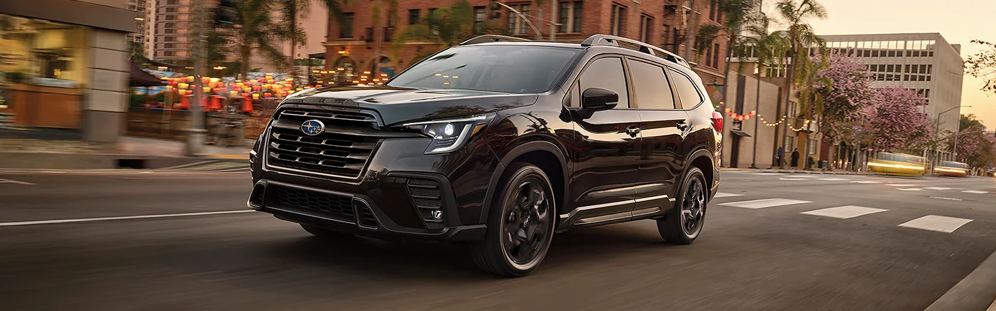 A 2025 Subaru Ascent driving though the city