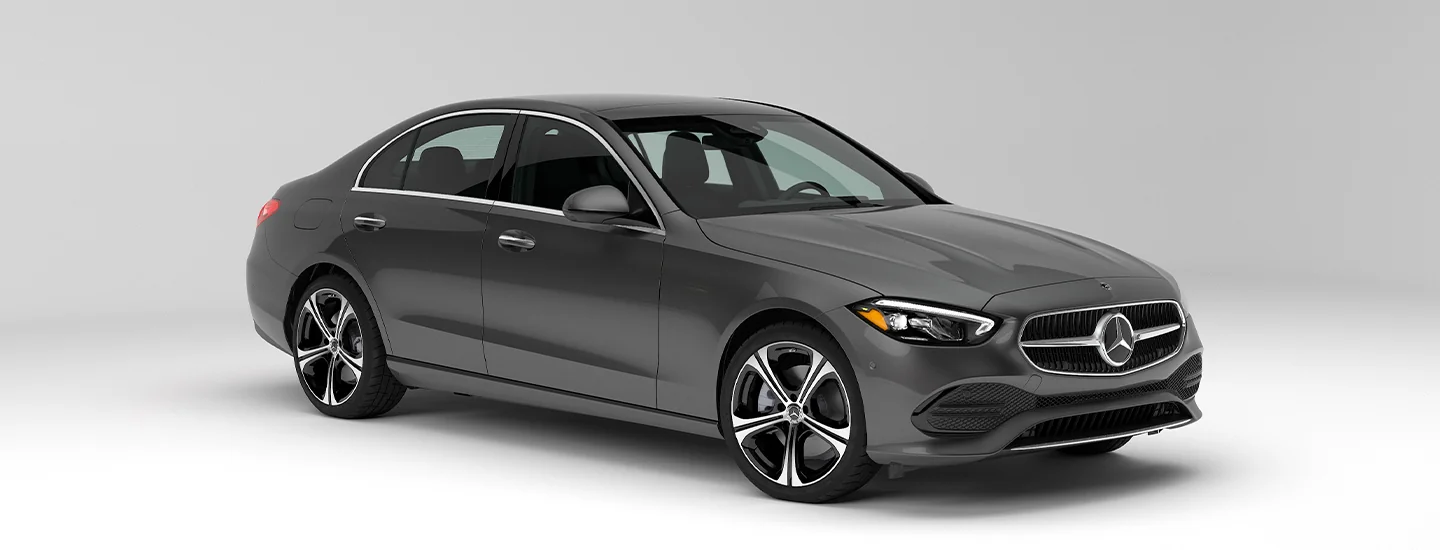 Gray 2025 Mercedes-Benz C-Class parked in white showroom