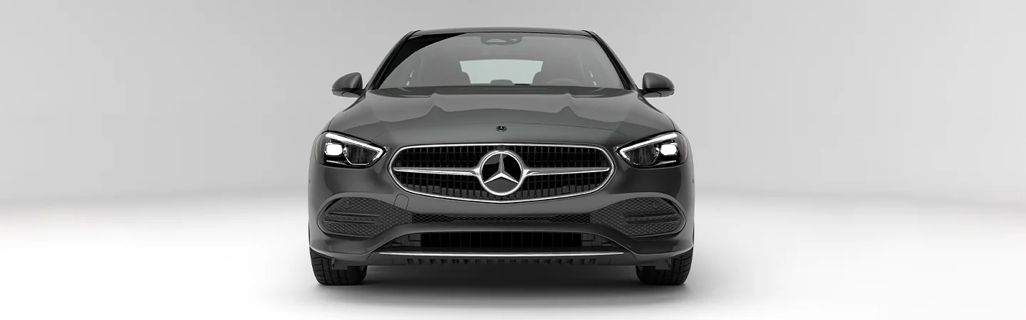 Front view of a 2025 Mercedes-Benz C-Class parked in a show room