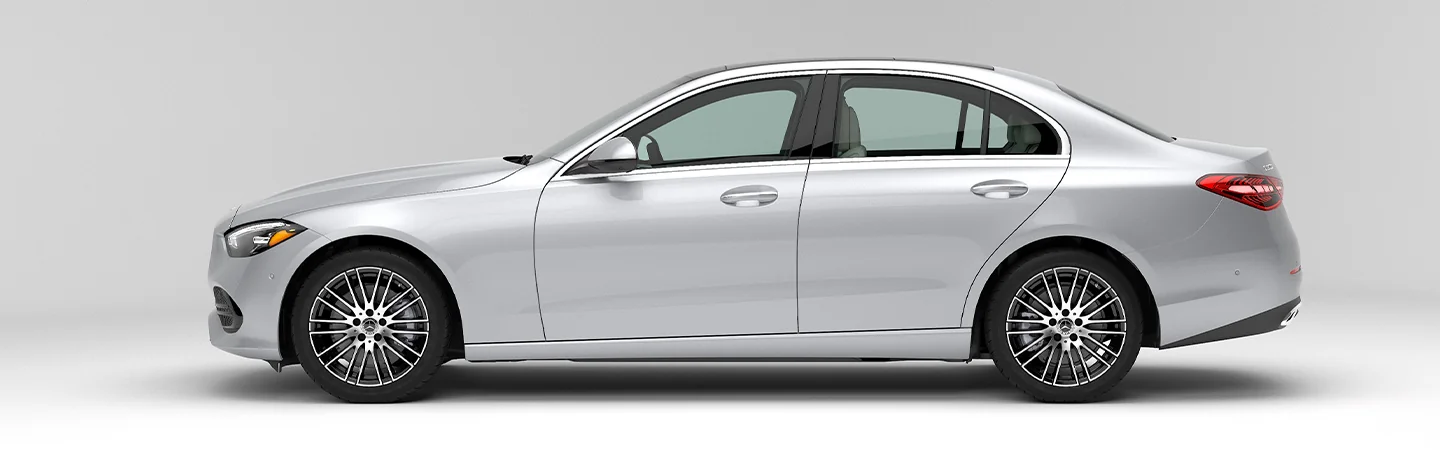Side view of a parked 2025 Mercedes-Benz C-Class in a showroom