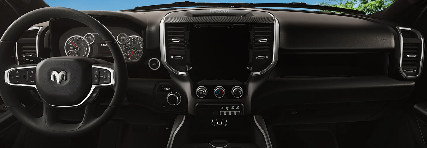 Interior view of the dashboard and tech of a 2026 RAM 1500