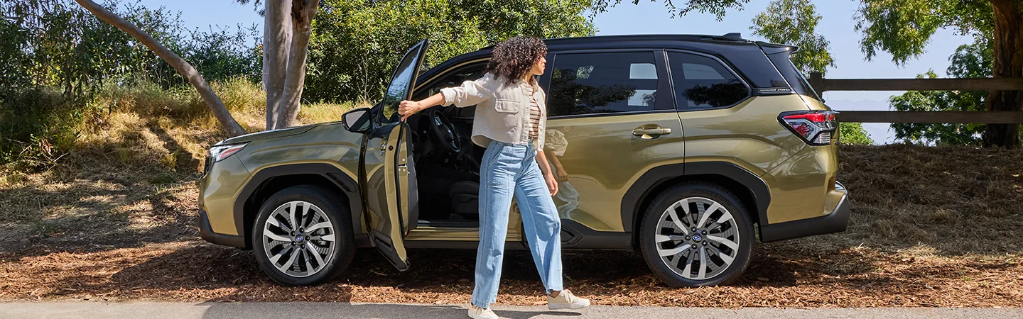 2025 Subaru Forester Hybrid with the driver leaving car