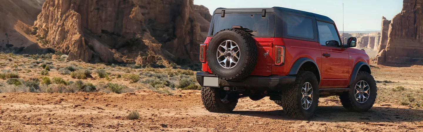 red new Ford Bronco fourwheeling