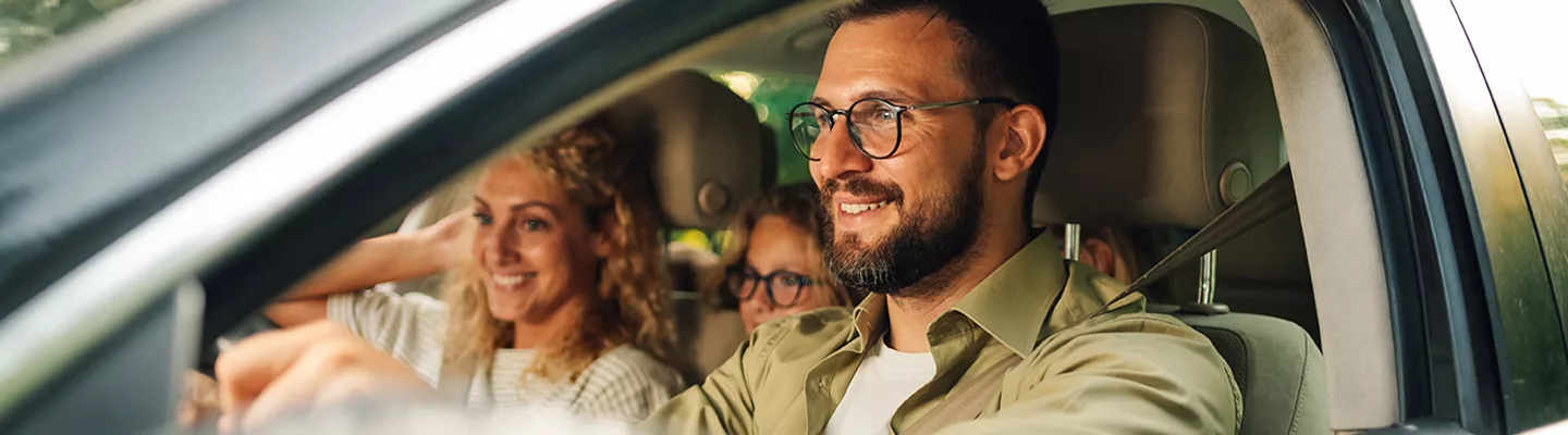 Family driving in a used Dodge Durango from Hilltop Chrysler Jeep Dodge